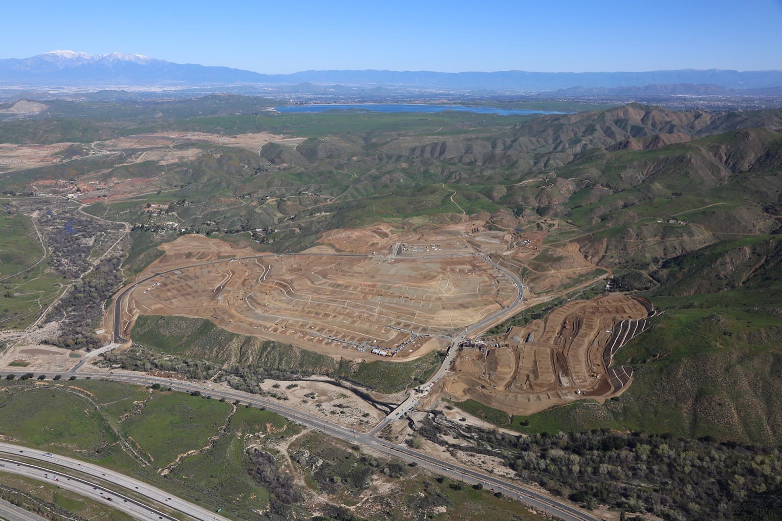 Hillside residential tract under grading, showing how terrain affects usable land